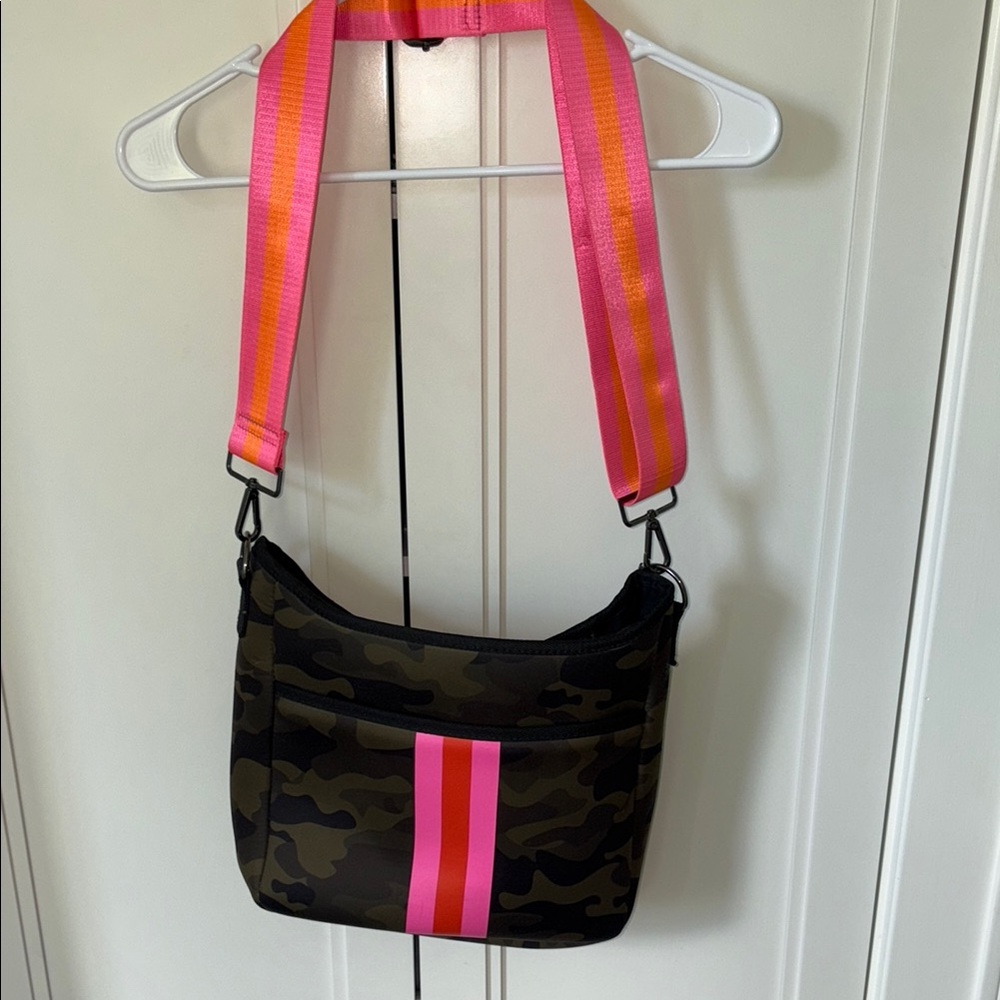 HAUTE SHORE Black Crossbody Bag with Pink and Orange Strap